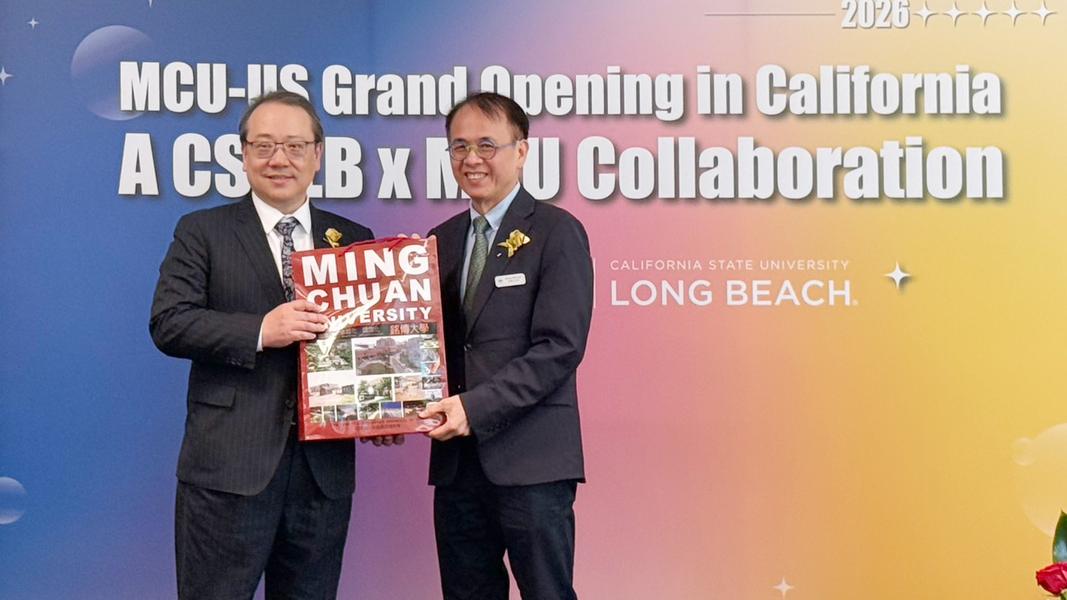 (圖/其他)駐洛杉磯台北經濟文化辦事處處長馬博元、銘傳大學校長李選士合影交流。