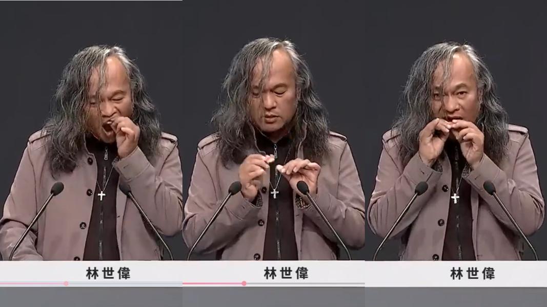 林世偉曾在政見會上噴飛假牙。(圖/翻攝自YouTube-中央選舉委員會)