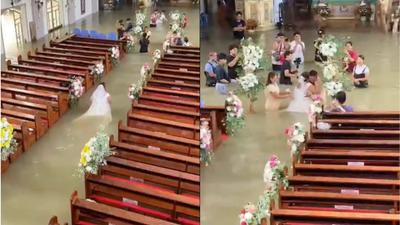 「永浴愛河」成真!菲教堂淹水及腰還是要結婚 白紗新娘涉水走紅毯