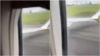 歐洲廉航降落險出事!機翼「歪一邊撞地面」驚險畫面曝 乘客嚇呆