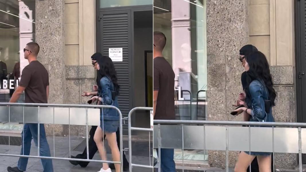 粉絲稱這位全身丹寧裝的女子為品牌方的宣傳人員,單純只是陪崔傘來工作。(圖/翻攝自韓網)