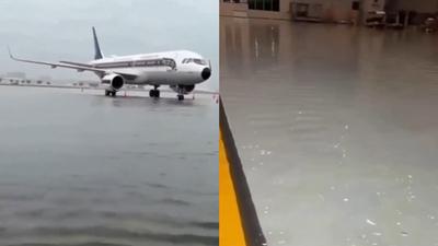 停機坪、滑行道淹成湖!曼谷機場航廈遇水患 航空公司急助改票