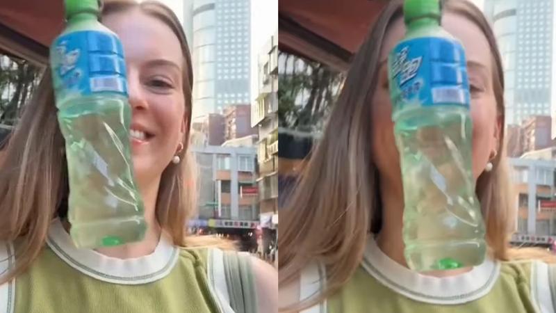 莫彩曦對於掛在廣告布條下方的寶特瓶感到相當困擾。(圖/翻攝自@hailey_jane IG)