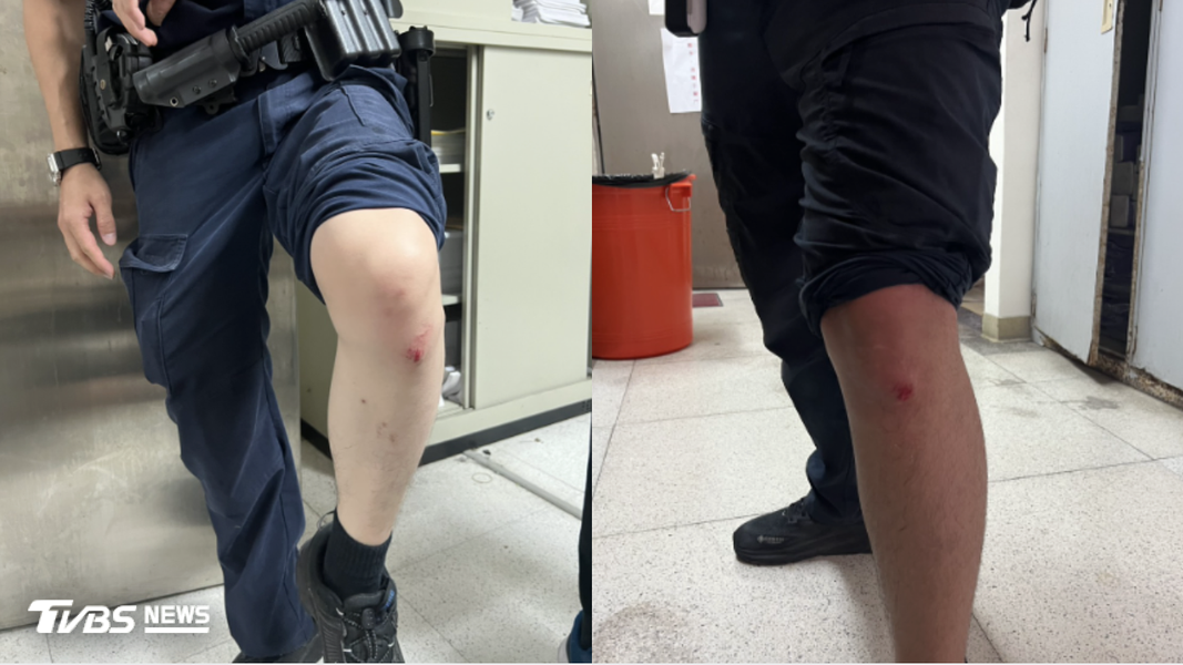 警方在噴辣椒水控場過程中受傷。(圖/TVBS)