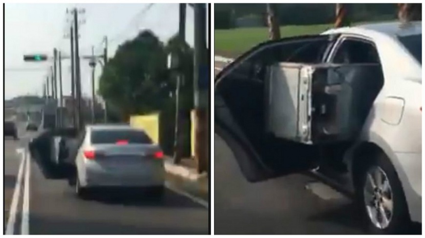 影/把轎車當貨車!冰箱塞後座凸一截開上路