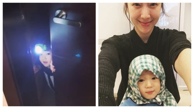 Lucy探頭燦笑的模樣和哥哥超級相似