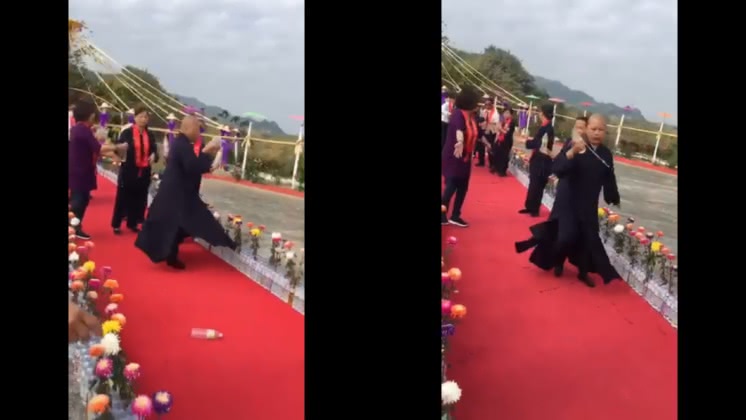 惠嚴法師以旋轉灑水的方式祈福。圖／翻攝自惠嚴法師臉書專頁影片