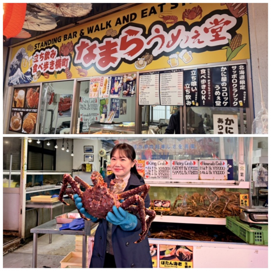 ▲札幌「うめえ堂」立食區,手捧鮮活巨型帝王蟹,感受鮮美。