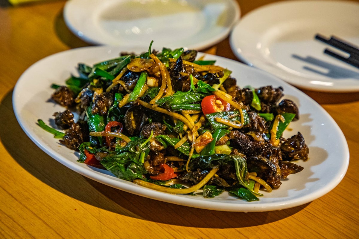 「塔香螺肉」(180元)螺肉各頭都不小,滋味香辣過癮,最適合當下酒菜。(圖/大手牽小手。玩樂趣提供)