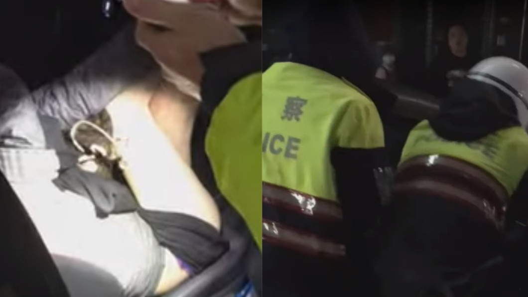 警方無奈之下只能將女子拔離下車。(圖/翻攝自爆料公社)