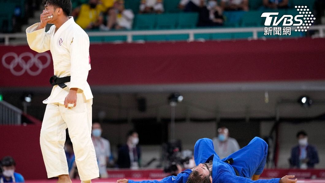 楊勇緯確定挺進金牌戰時激動落淚。(圖/達志影像美聯社)