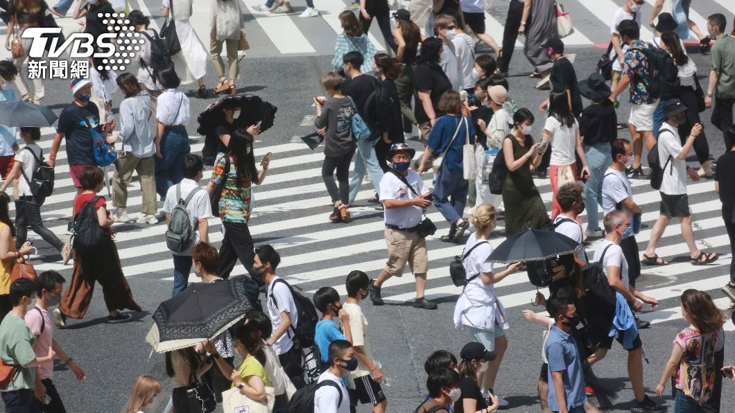 日本13、14日連2天確診逾2萬例。(圖/達志影像美聯社)