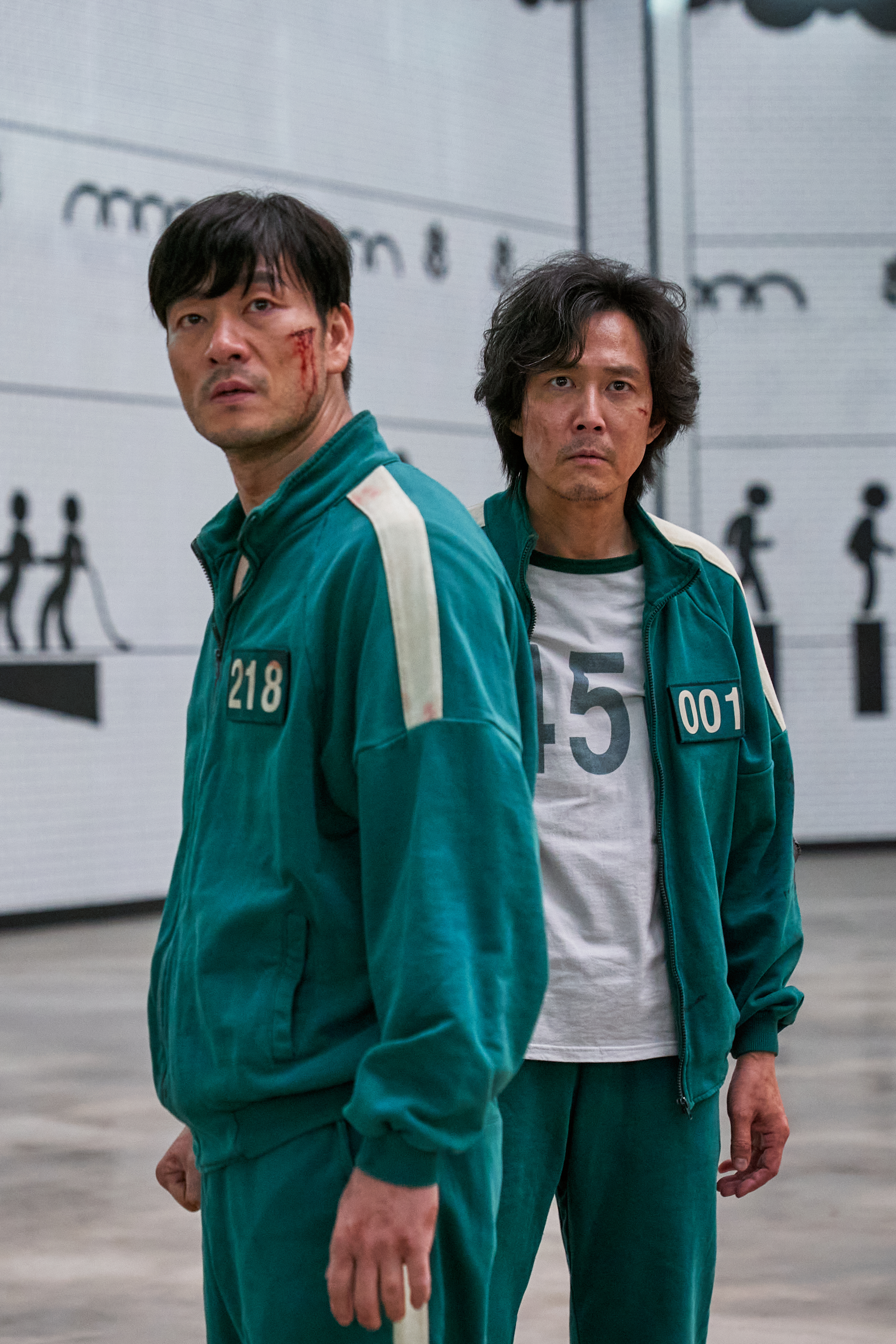 李政宰、朴海秀為錢加入「魷魚遊戲」。(圖/Netflix提供)