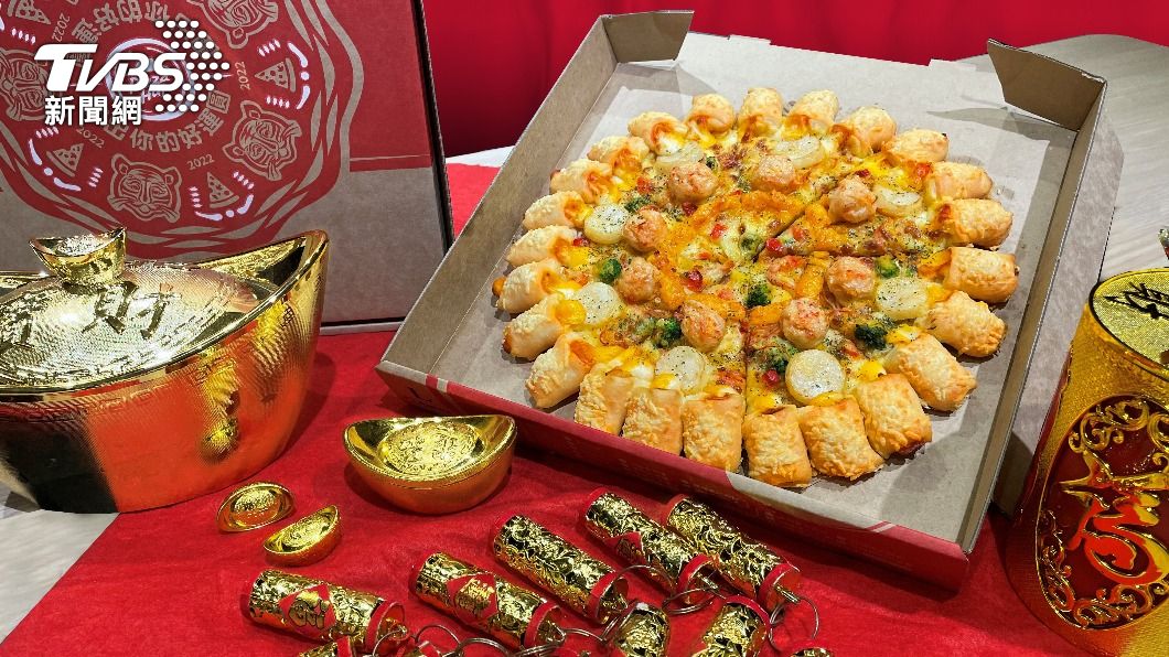 一圓好運龍蝦干貝比薩以多汁鮮嫩干貝為主角。（圖／必勝客提供）