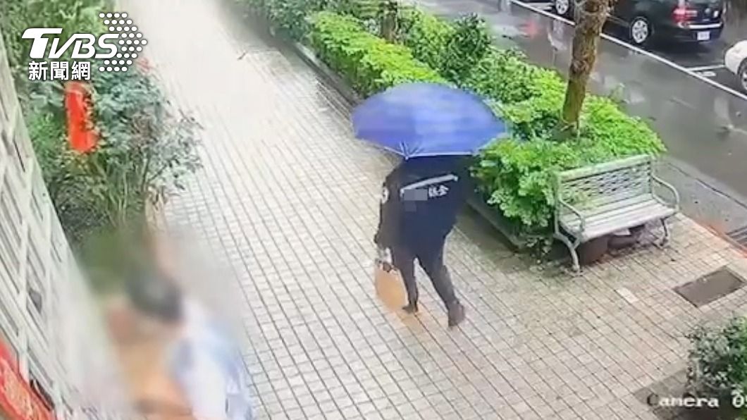 楊男穿保全外套犯案。(圖/TVBS)