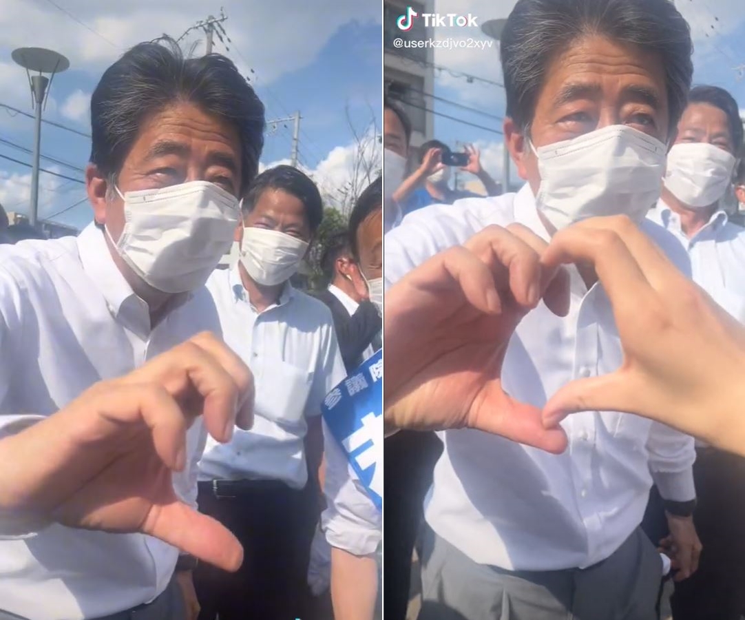 安倍晉三親民地比出愛心手勢。（圖／翻攝自TikTok平台）