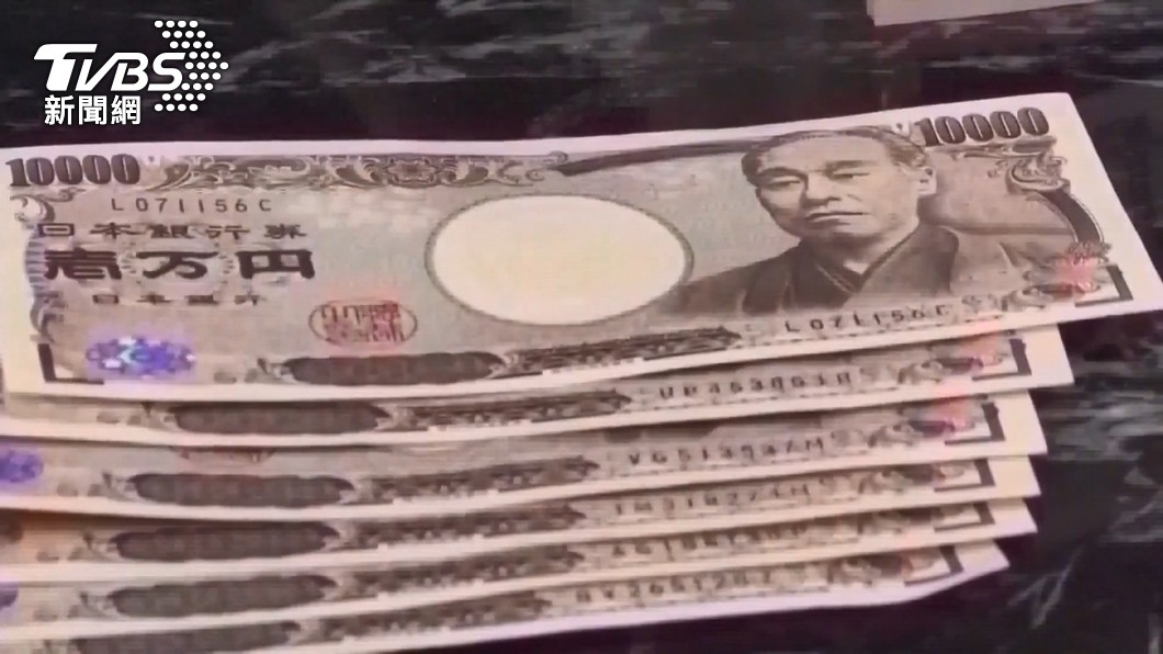 日圓貶值讓哈日族趕快去兌換外幣。(圖/TVBS)