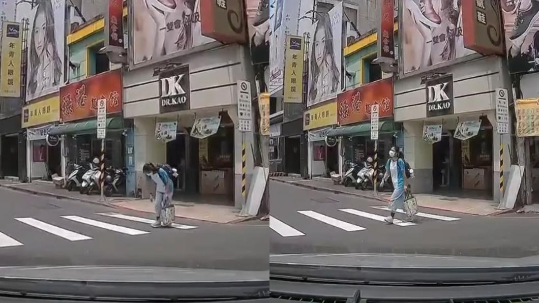 見車子停下禮讓，女同學竟90度鞠躬道謝。（圖／翻攝自八卦村 - 行車紀錄器影片上傳中心）
