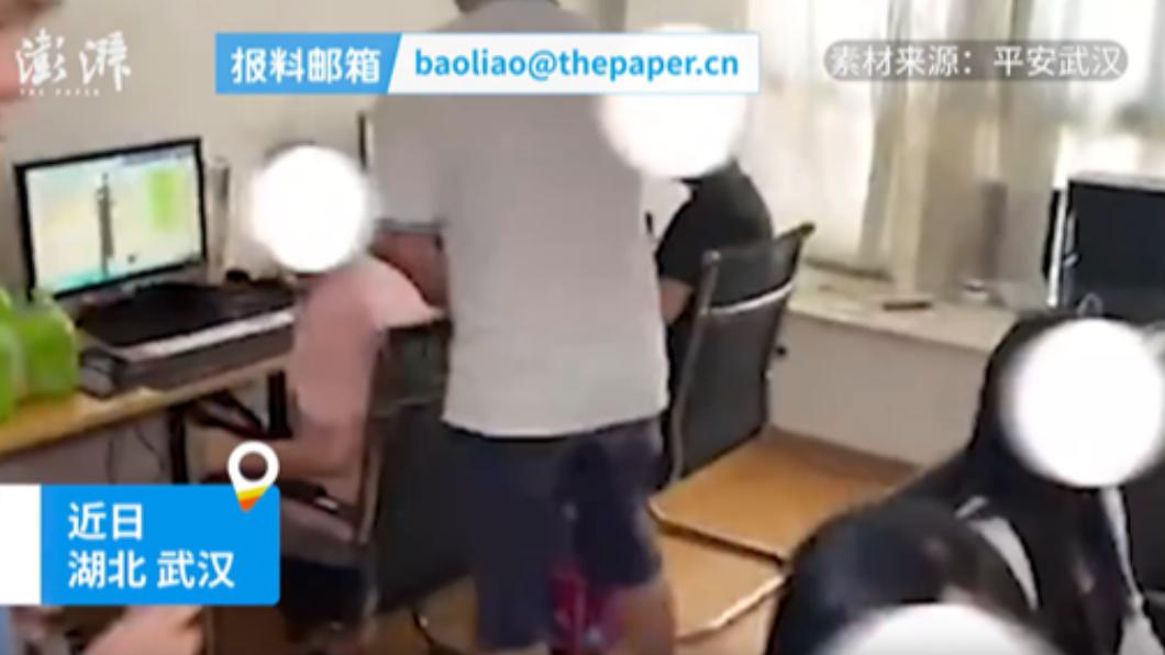 武漢警方破獲一處假冒老中醫的詐騙集團總部。(圖/翻攝自澎湃新聞)