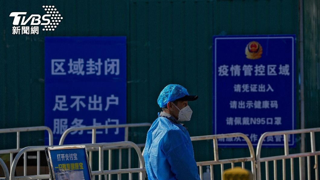 中國大陸疫情連三天破萬。（圖／達志影像美聯社）