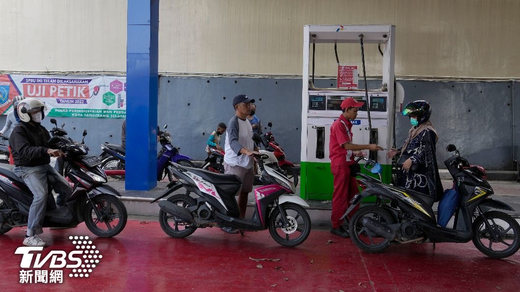 摩托車是印尼當地最重要的交通工具。(圖/達志影像美聯社)