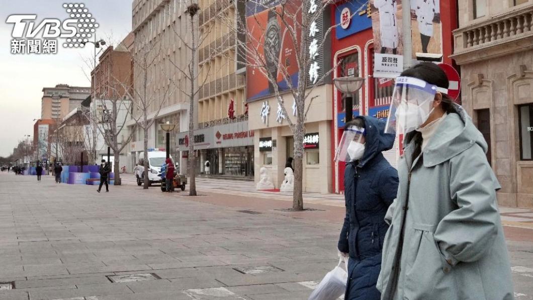 有專家預測,中國大陸14億人口未來數月將達成半數感染。(圖/達志影像美聯社)
