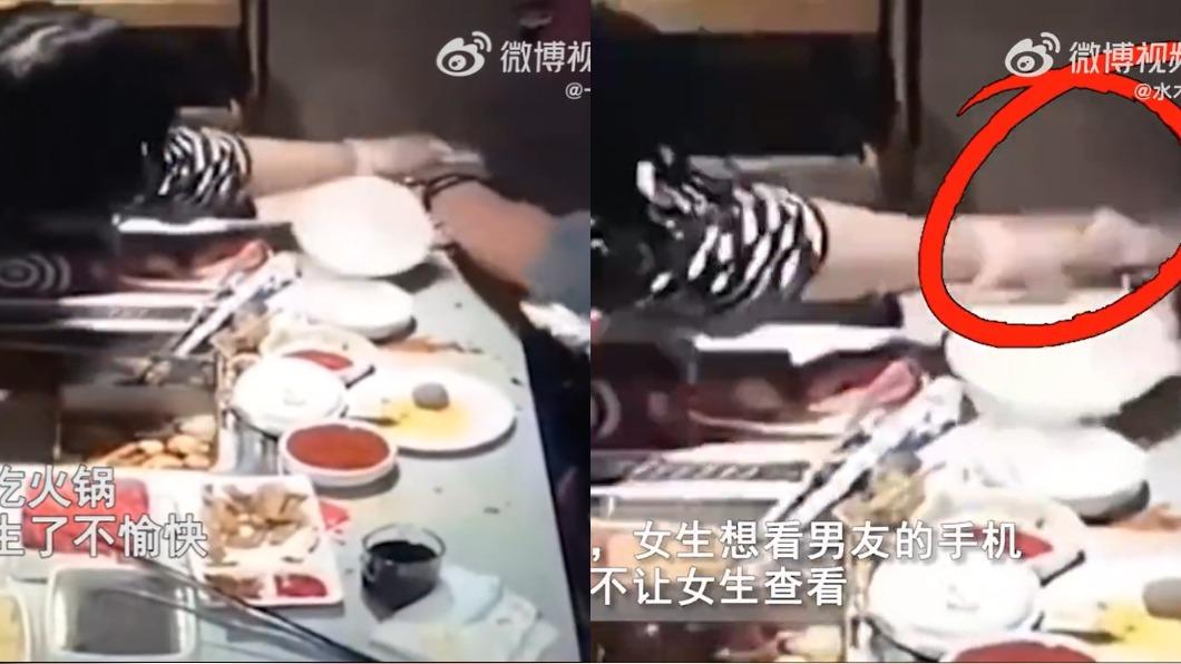 女子嘗試想拿取男友手機。(圖/翻攝自一品融媒微博)