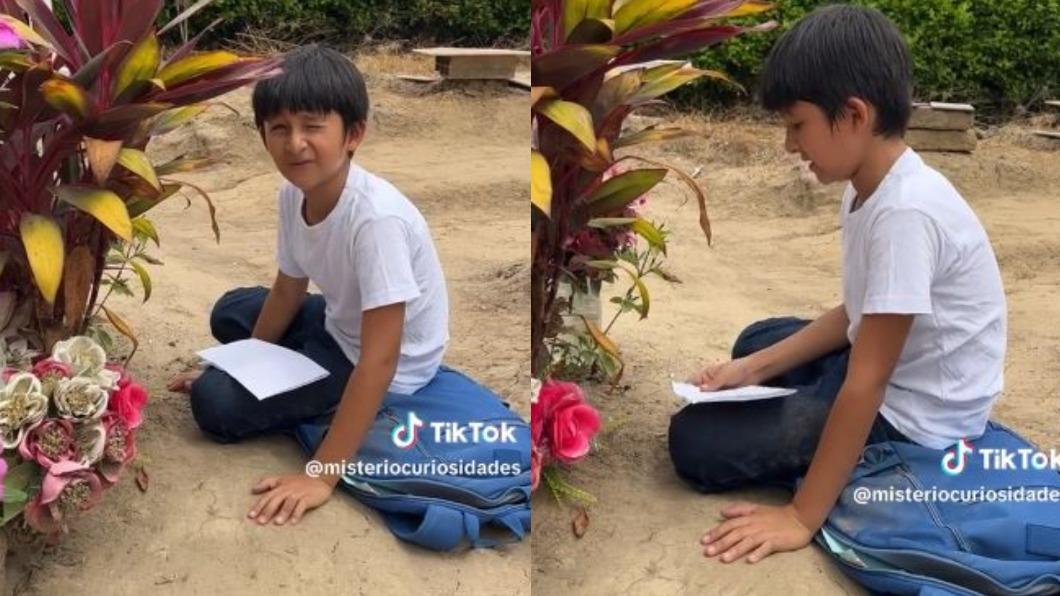 男童安靜地坐在母親墳墓前寫作業。(圖/翻攝自「misteriocuriosidades」TikTok)
