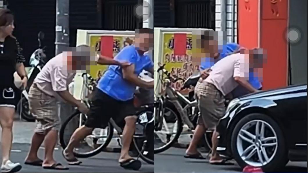 張男對陳男揮拳。(圖/翻攝自記者爆料網)