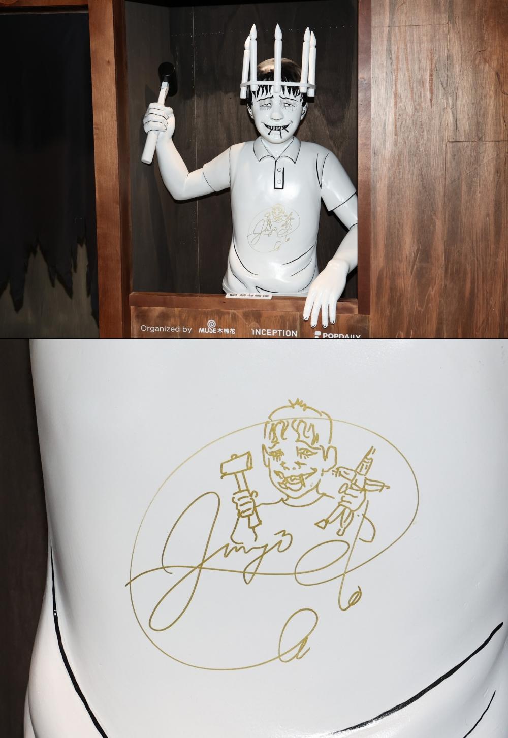 伊藤潤二還在雙一的立體裝置上作畫。（圖／趙世平攝）