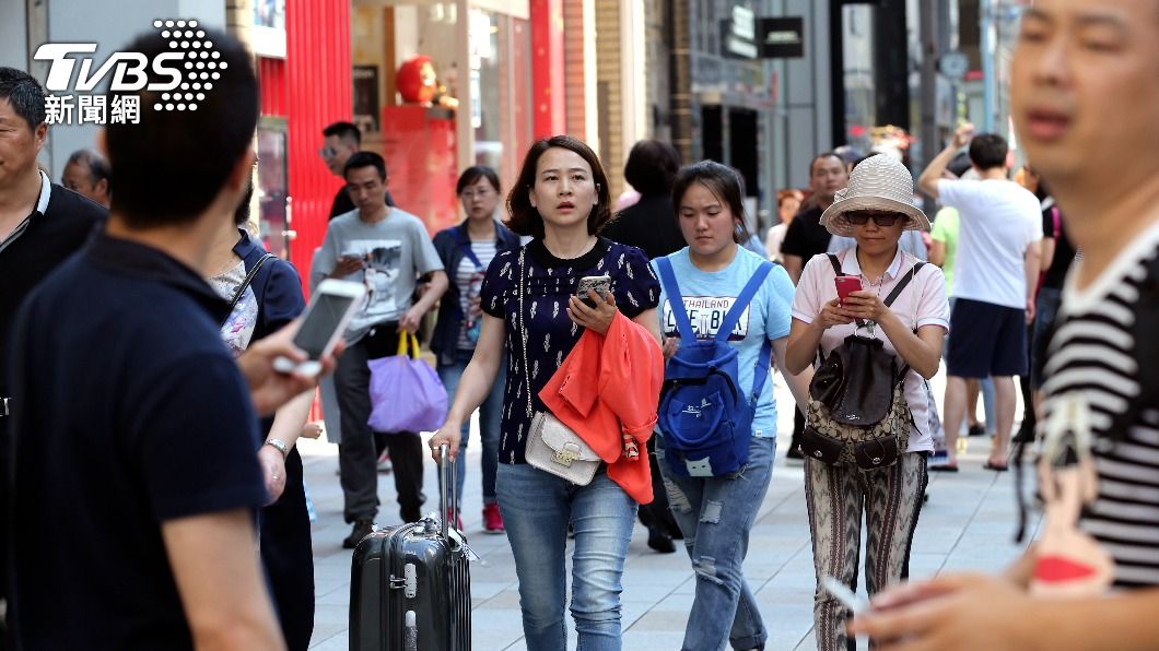 日媒報導,中國政府最快今天(10日)將宣布開放旅行團赴日本旅遊。(圖/達志影像美聯社)