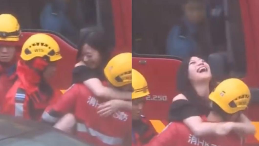 該名女子被消防員救出車外後,露出幸福燦笑。(圖/翻攝自@有線新聞)