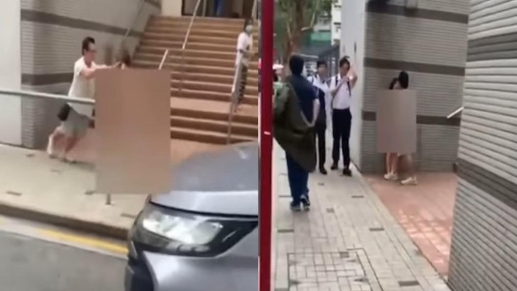 一旁的路人褪下外套幫女子遮住身體。(圖/翻攝自@Now Hk YouTube)
