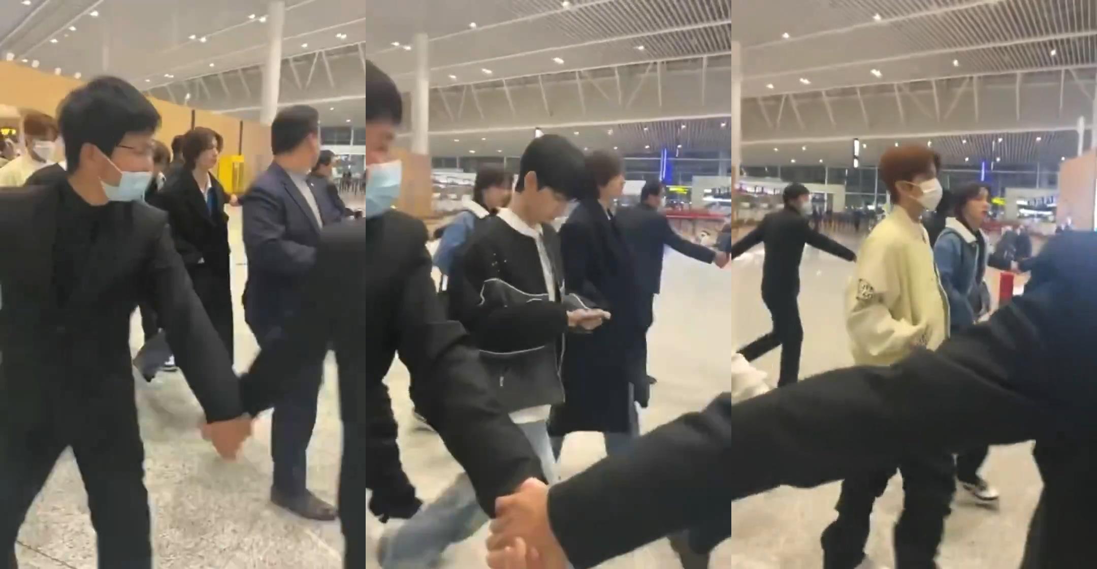 BOYNEXTDOOR的保鑣竟直接在機場手牽手圍起人牆。(圖/翻攝自BBOSONGEEEEE推特)