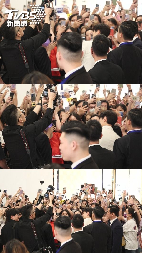李俊昊特意走到較遠的粉絲群中,跟一位幸運粉絲拿手機合照。(圖/趙世平攝)