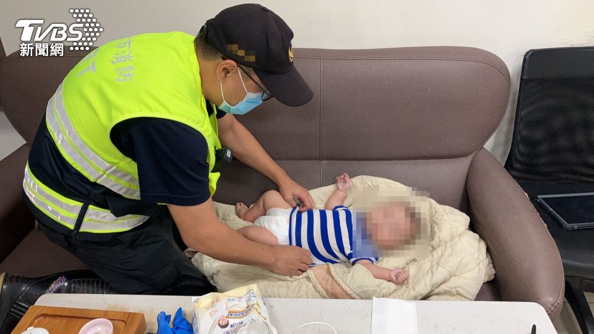 通緝女犯崩潰痛哭遭逮,未滿1歲男嬰被遺忘在車上。(圖/TVBS)