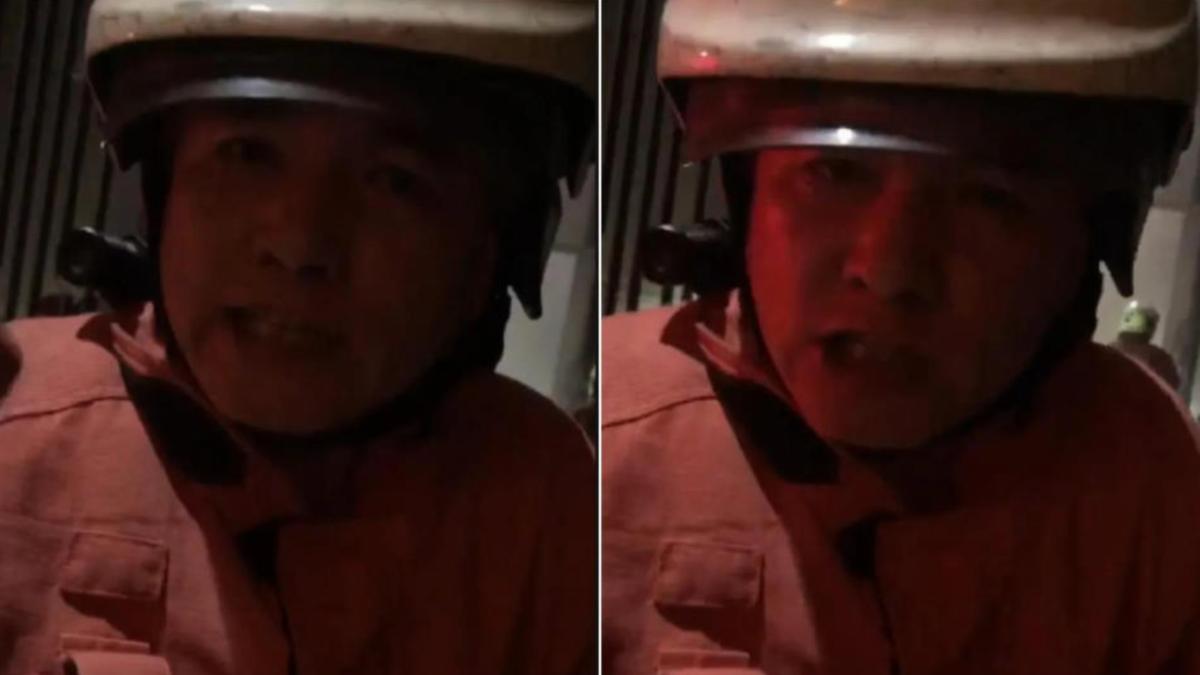 新竹市消防局金山分隊長陳佳民第一時間錄製影片，透過管委會傳給大樓住戶。（圖／TVBS）