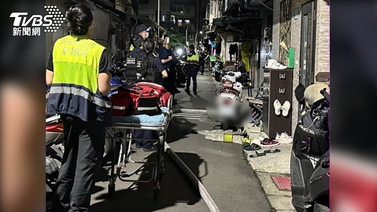 賴姓男子欲引爆瓦斯,大批警消趕抵現場。(圖/TVBS)