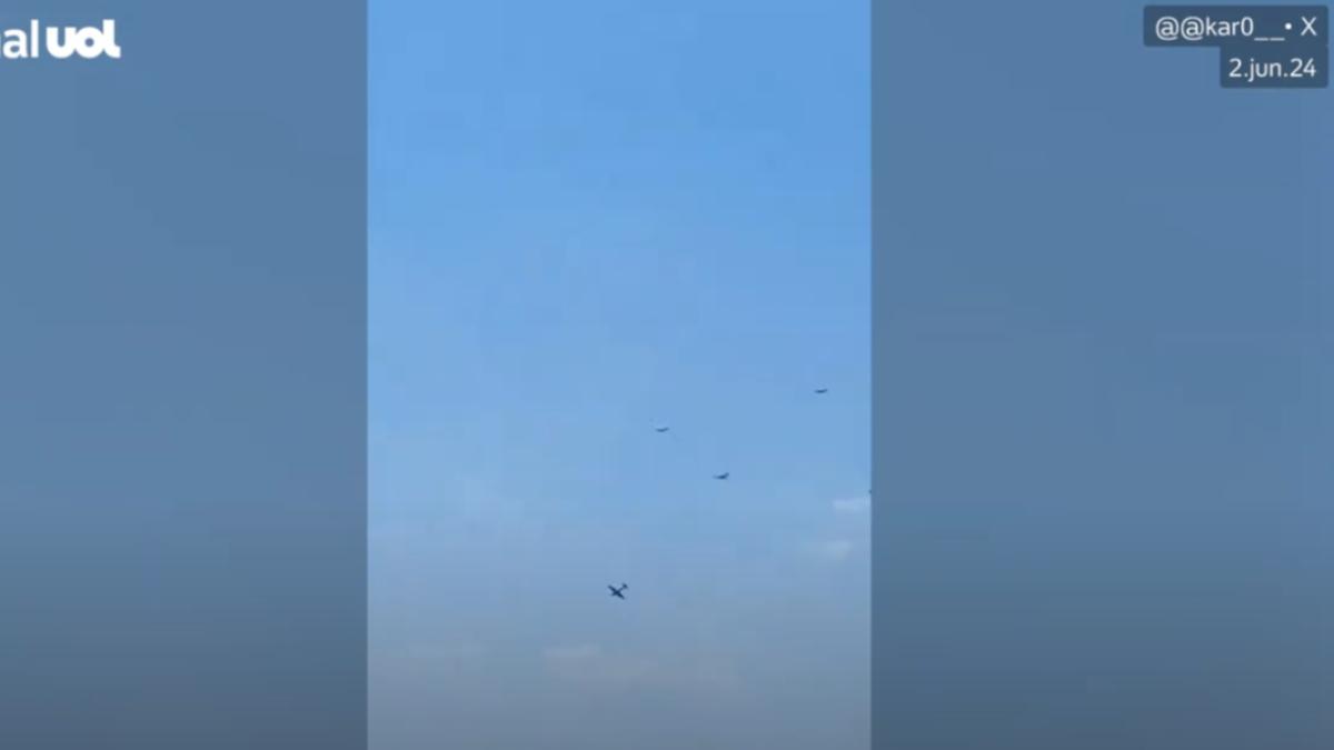 參與航空展的民眾拍到特技表演隊發生意外與墜機的瞬間畫面。(圖/翻攝自UOL新聞影片)