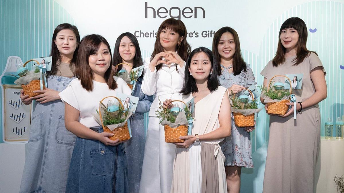 Selina開心感受6位孕媽咪的幸福氛圍。(圖/hegen提供)