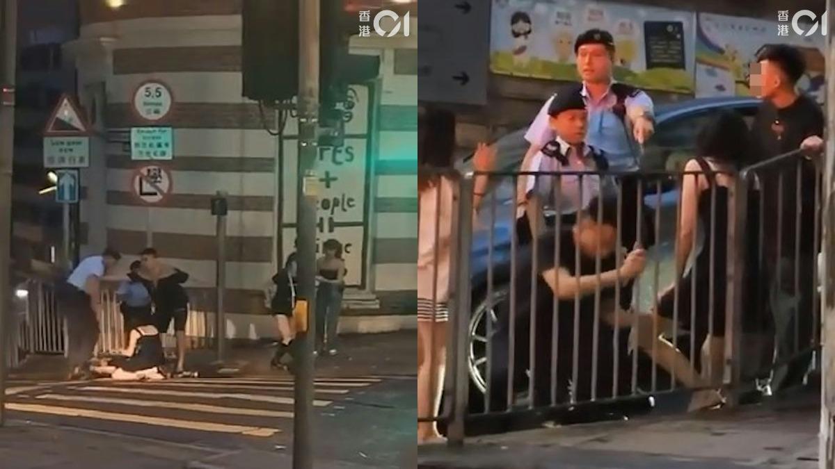 鬥毆人士被警方帶走。（圖／香港01）