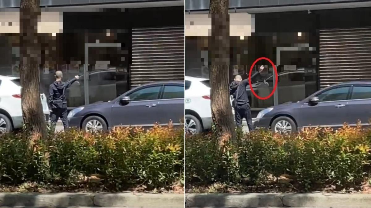 高姓槍手朝鐵捲門連轟18槍。(圖/翻攝記者爆料網)