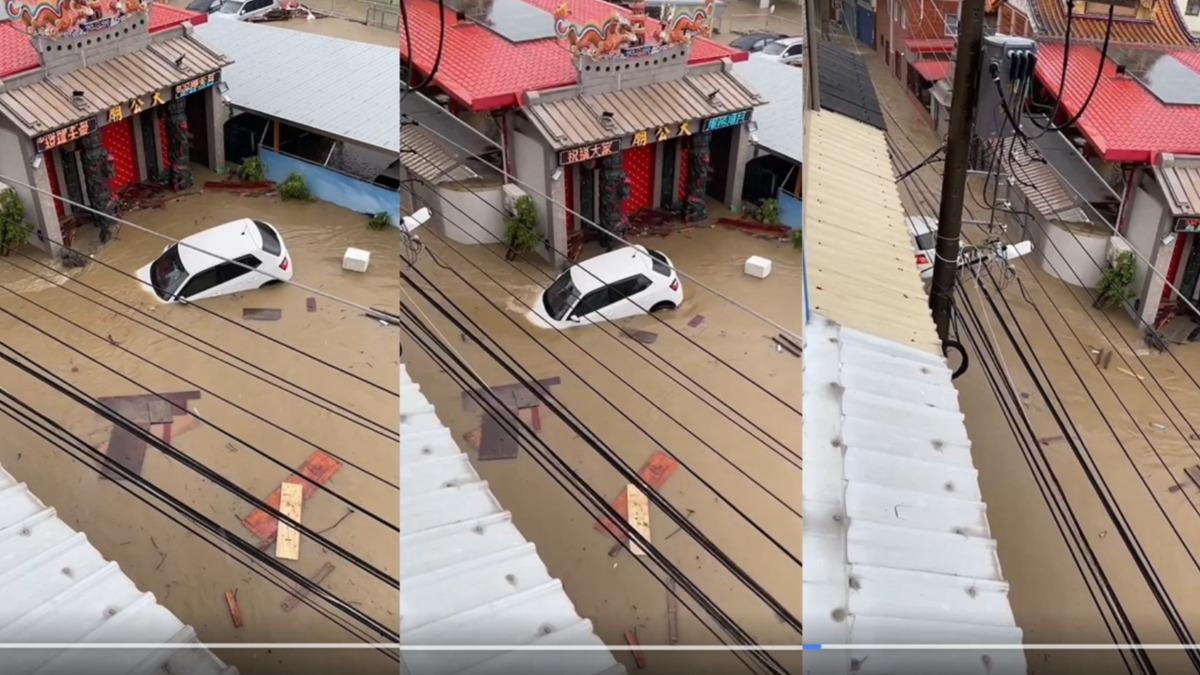高雄大社區,一輛轎車在街道中被沖走。(圖/翻攝自臉書高雄點Kaohsiungtien)