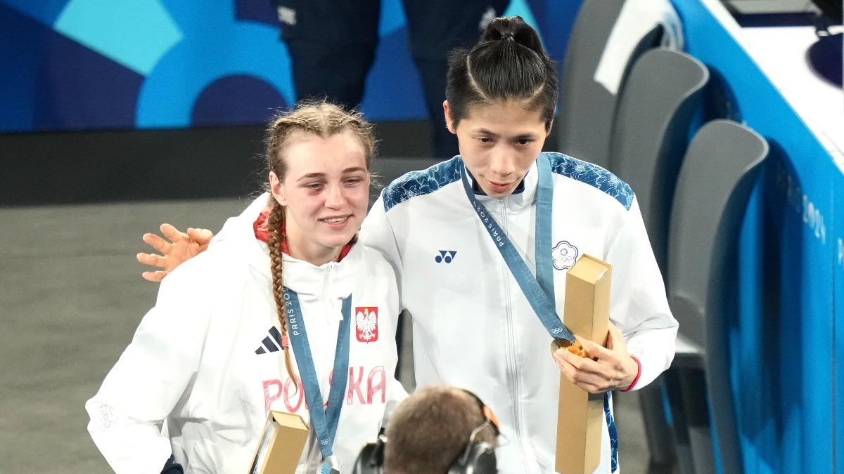 林郁婷與銀牌波蘭選手Julia Szeremeta合影。（圖／中華奧會提供）