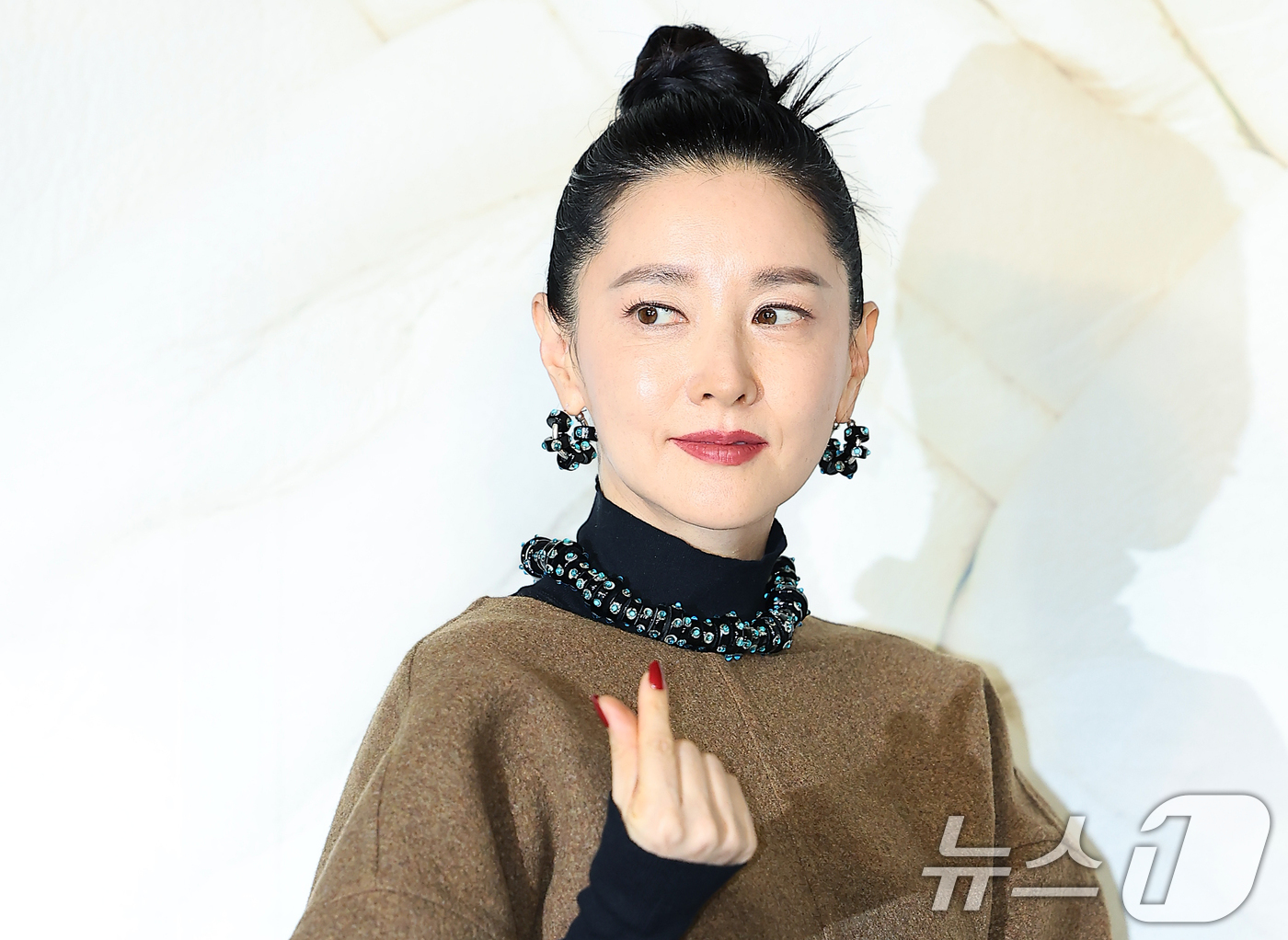 53歲女星李英愛現身活動現場,網讚狀態太勇。(圖/news1)