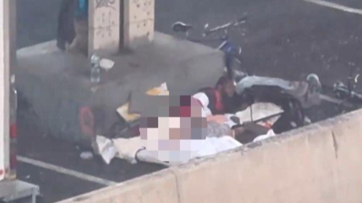 遊民男抱下身赤裸女停車場激情活春宮 紐約客錄影氣喊:想搬家