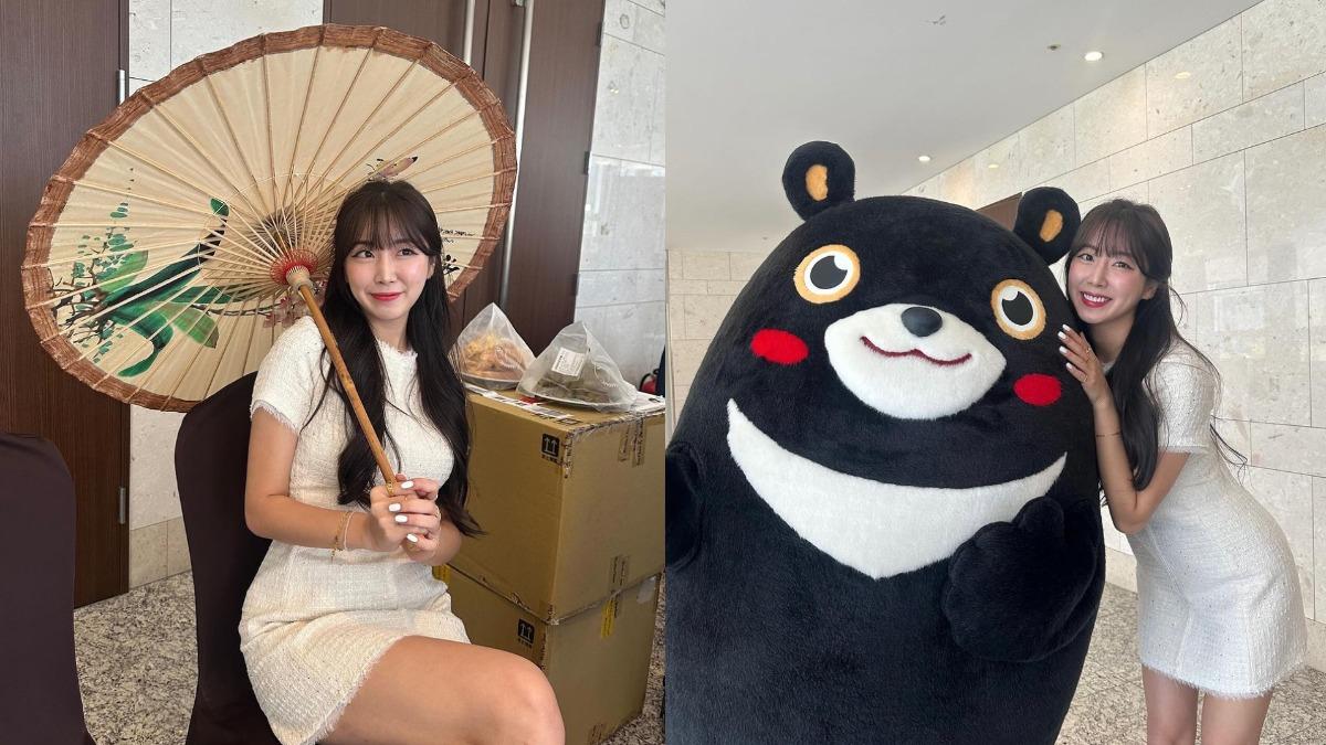 安芝儇拿著美濃紙傘、與吉祥物「高雄熊」合影。(圖/翻攝自安芝儇IG)