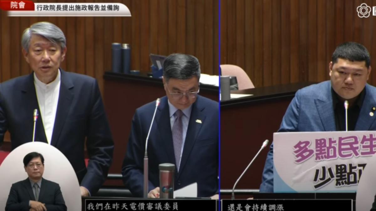 郭智輝談漲電價稱「院長決定」,原本正低頭看文件的卓榮泰立刻抬起頭,表情也略尷尬。(圖/翻攝自國會議事轉播頻道)