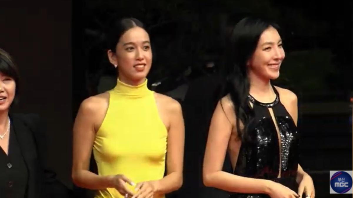 陳庭妮(左)身穿鮮亮的黃色禮服。(圖/翻攝自부산MBC YT頻道)