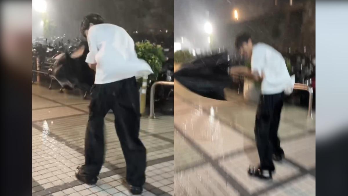 淡大學生雨傘被吹爆。（圖／翻攝自 Threads）